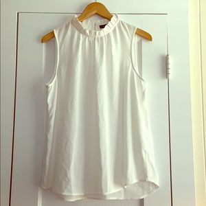 White ruffle neck blouse